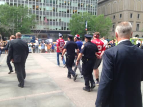 patriots-protesters-police.jpg